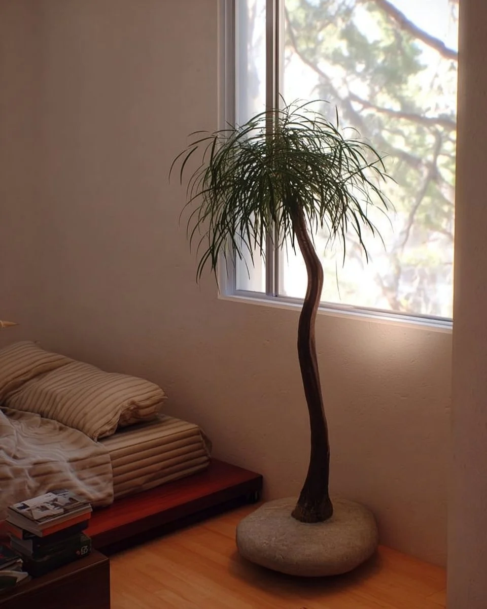 A bottle tree in a disc vessel adds charm to a sunny primary bedroom in 2025.