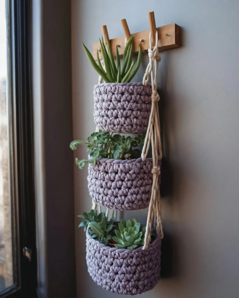 Crochet three-tier plant hangers showcasing creative indoor plant arrangements.